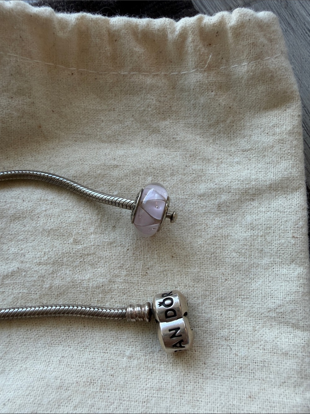 Pandora Sterling silver and pink glass bead charm